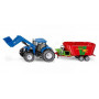 NEW HOLLAND AVEC MELANGEUSE DE FOURRAGE "STRAUTMANN"